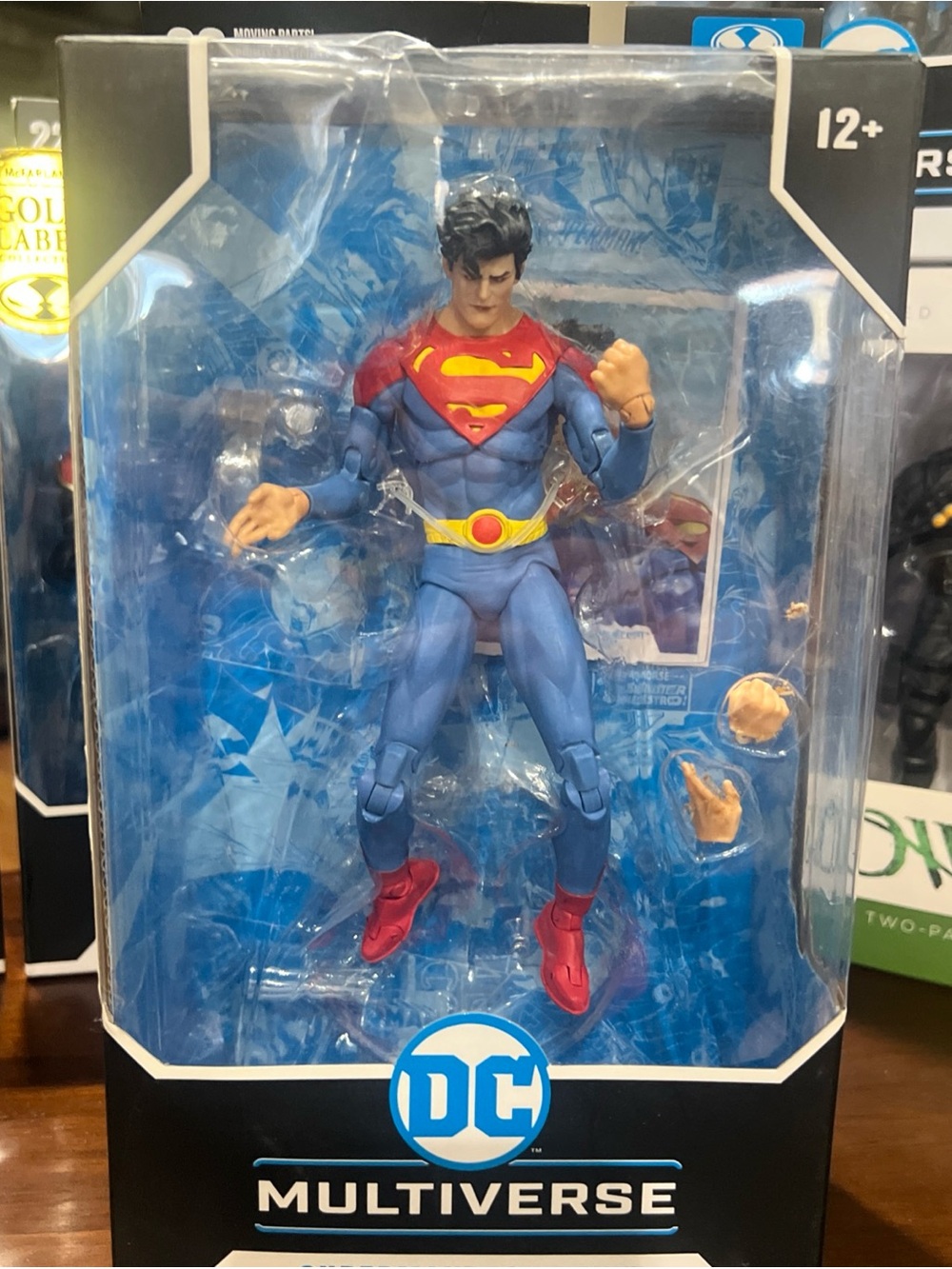DC Multiverse Superboy Action Figure - Blue, Red, Yellow